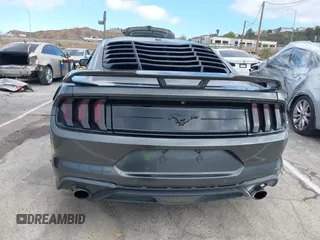 2018 Ford Mustang EcoBoost z VIN 1FA6P8THXJ5154523, wystawiony jako IAAI lot #41523923 z przebiegiem 94 330 mil mil oraz . Historia ofert i sprzedaży dostępna na DreamBid. Obrazek 16.