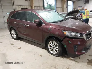 2019 Kia Sorento L with VIN 5XYPG4A34KG548624, listed as a IAAI auction lot 42020831 with 124,226 mi miles. Bid and sale history available at carsss.com. Image 1.