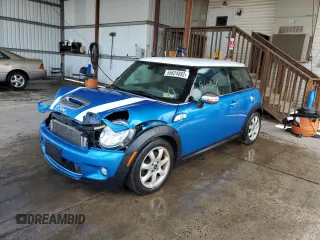 2009 MINI Hardtop S with VIN WMWMF73539TW83580, listed as a Copart auction lot 80143763 with 96,464 mi miles and Salvage Title. Bid and sale history available at DreamBid. Image 1.