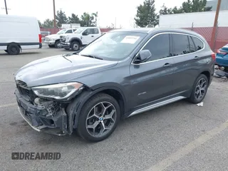 2016 BMW X1 xDrive28i with VIN WBXHT3C32GP886084, listed as a IAAI auction lot 41895754 with 85,662 mi miles and . Bid and sale history available at DreamBid. Image 2.