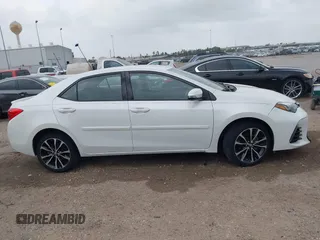 2019 Toyota Corolla L with VIN 5YFBURHE0KP875377, listed as a IAAI auction lot 41904405 with 73,604 mi miles and . Bid and sale history available at DreamBid. Image 13.