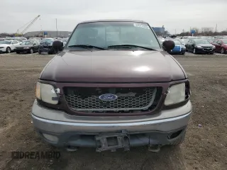 2001 Ford F-150 XL with VIN 1FTRX18L61NB40999, listed as a Copart auction lot 49641305 with 216,452 mi miles and Salvage Title. Bid and sale history available at carsss.com. Image 5.