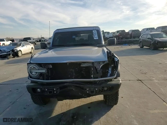 2022 Ford Bronco with VIN 1FMEE5DHXNLA86164, listed as a Copart auction lot 87763025 with 8,715 mi miles and Salvage Title. Bid and sale history available at carsss.com. Image 11.