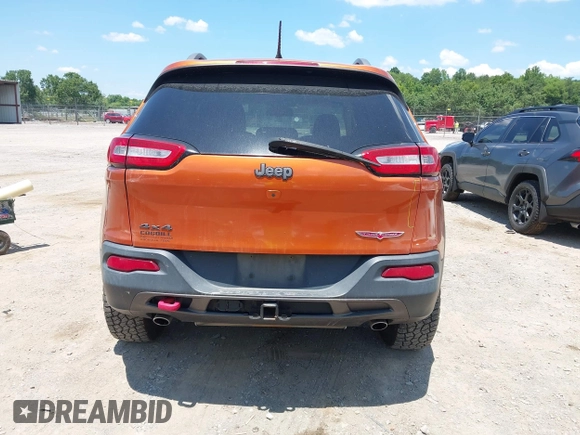 2016 Jeep Cherokee Trailhawk with VIN 1C4PJMBS6GW318035, listed as a IAAI auction lot 42652034 with 187,519 mi miles and . Bid and sale history available at DreamBid. Image 16.