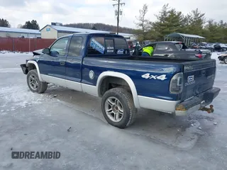 2004 Dodge Dakota SLT with VIN 1D7HG42N74S665198, listed as a IAAI auction lot 41477799 with 213,175 mi miles. Bid and sale history available at carsss.com. Image 3.