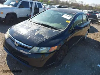 2006 Honda Civic Sdn LX with VIN 1HGFA16586L139771, listed as a IAAI auction lot 41894847 with 230,878 mi miles. Bid and sale history available at carsss.com. Image 2.