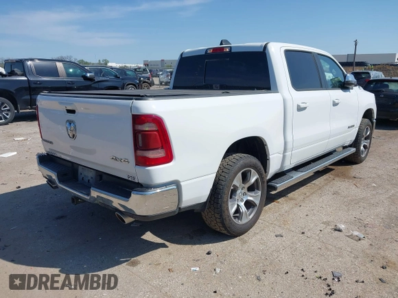 2023 Ram 1500 Laramie with VIN 1C6SRFJT0PN508550, listed as a IAAI auction lot 41913849 with 57,765 mi miles and . Bid and sale history available at DreamBid. Image 4.
