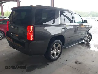 2017 Chevrolet Tahoe LT with VIN 1GNSKBKC8HR326004, listed as a IAAI auction lot 42256494 with 101,486 mi miles and . Bid and sale history available at DreamBid. Image 4.