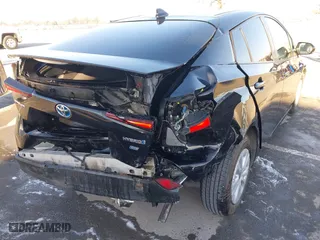 2019 Toyota Prius L Eco with VIN JTDKARFU9K3090948, listed as a IAAI auction lot 41400008 with 113,323 mi miles. Bid and sale history available at carsss.com. Image 6.
