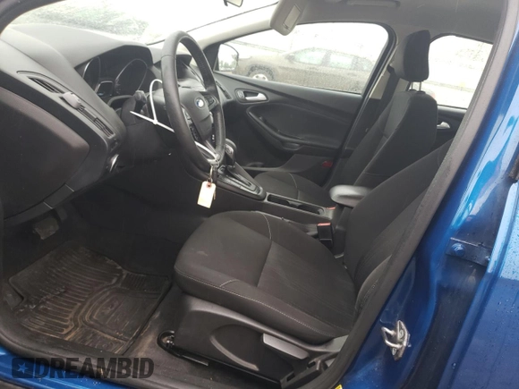 2018 Ford Focus SE with VIN 1FADP3F29JL258787, listed as a Copart auction lot 59678925 with 142,524 mi miles and Clean title. Bid and sale history available at DreamBid. Image 7.