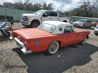1957 Ford Thunderbird with VIN D7FH395675, listed as a Copart auction lot 77234434 with 15,312 mi miles and Salvage Title. Bid and sale history available at DreamBid. Image 3.