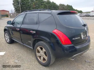 2003 Nissan Murano SL with VIN JN8AZ08T23W121885, listed as a IAAI auction lot 41954132 with 157,454 mi miles. Bid and sale history available at carsss.com. Image 3.