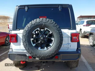 2025 Jeep Wrangler Rubicon with VIN 1C4PJXFN8SW527131, listed as a IAAI auction lot 41502676 with 1,051 mi miles and . Bid and sale history available at DreamBid. Image 16.