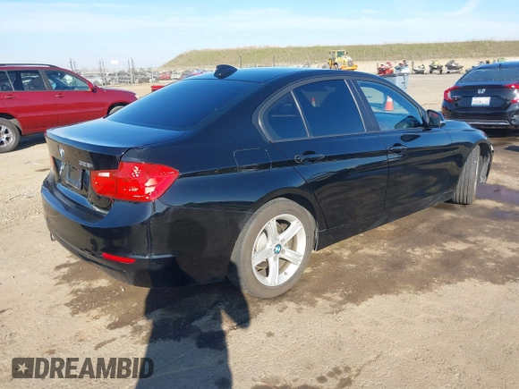 2014 BMW 3 Series 328i with VIN WBA3C1C55EK117180, listed as a IAAI auction lot 41389969 with 163,760 mi miles. Bid and sale history available at carsss.com. Image 4.