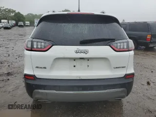 2019 Jeep Cherokee Limited z VIN 1C4PJMDXXKD409564, wystawiony jako Copart lot #60893225 z przebiegiem 128 674 mil mil oraz Szkoda całkowita • Salvage title. Historia ofert i sprzedaży dostępna na DreamBid. Obrazek 6.