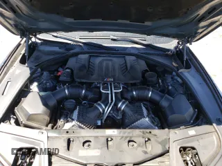2013 BMW M5 z VIN WBSFV9C50DC774172, wystawiony jako Copart lot #61990854 z przebiegiem Nie podano mil oraz Szkoda całkowita • Salvage title. Historia ofert i sprzedaży dostępna na DreamBid. Obrazek 11.