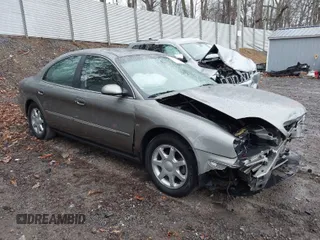 2003 Mercury Sable LS Premium with VIN 1MEFM55S13G612515, listed as a IAAI auction lot 41837589 with 62,173 mi miles. Bid and sale history available at carsss.com. Image 1.