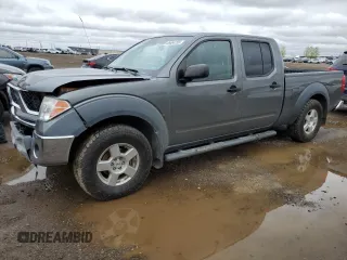 2008 Nissan Frontier LE z VIN 1N6AD09W58C411210, wystawiony jako Copart lot #56664755 z przebiegiem 286 386 mil mil oraz Szkoda całkowita • Salvage title. Historia ofert i sprzedaży dostępna na DreamBid. Obrazek 1.