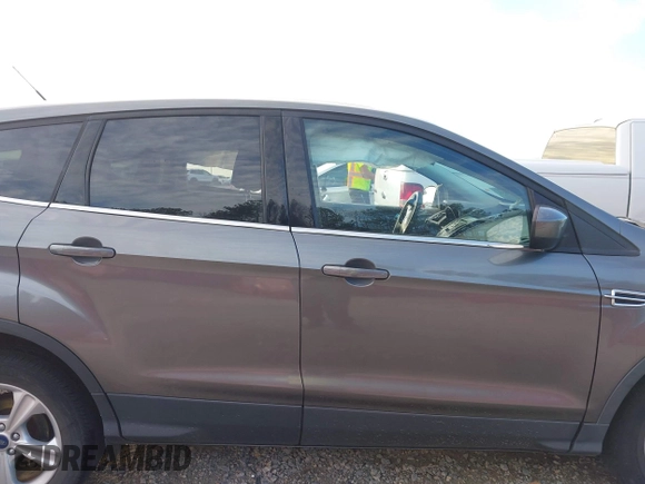 2014 Ford Escape SE with VIN 1FMCU9GX7EUD84797, listed as a IAAI auction lot 41430559 with 157,533 mi miles. Bid and sale history available at carsss.com. Image 13.