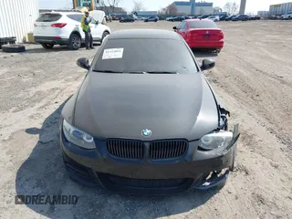 2013 BMW 3 Series 335is with VIN WBAKG1C57DJ217513, listed as a IAAI auction lot 41153004 with 1 mi miles. Bid and sale history available at carsss.com. Image 12.