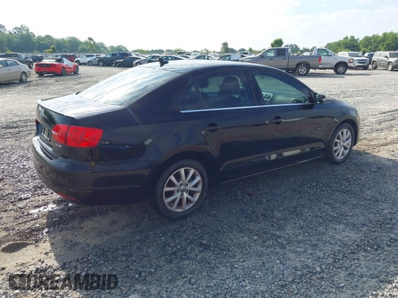 2013 Volkswagen Jetta SE z VIN 3VWDP7AJ5DM389618, wystawiony jako IAAI lot #42229952 z przebiegiem 190 890 mil mil oraz . Historia ofert i sprzedaży dostępna na DreamBid. Obrazek 4.