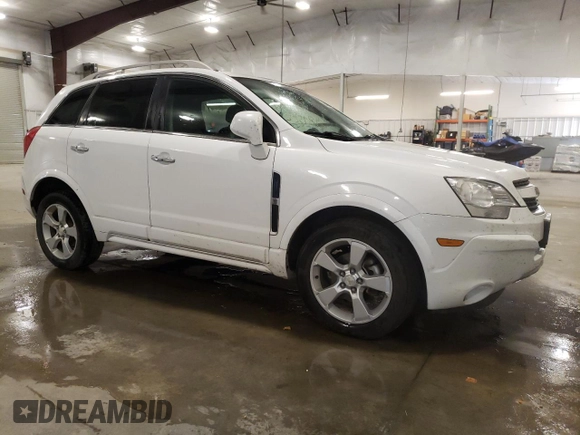 2014 Chevrolet Captiva Sport LT with VIN 3GNAL3EK4ES661268, listed as a Copart auction lot 74895224 with 128,513 mi miles and Salvage Title. Bid and sale history available at DreamBid. Image 4.