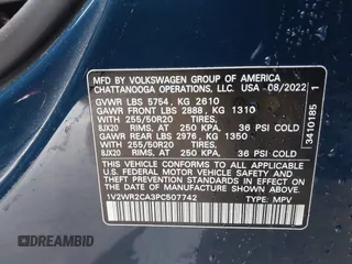 2023 Volkswagen Atlas SE z VIN 1V2WR2CA3PC507742, wystawiony jako IAAI lot #41282782 z przebiegiem 26 052 mil mil oraz . Historia ofert i sprzedaży dostępna na DreamBid. Obrazek 9.