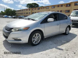 2010 Honda Insight EX z VIN JHMZE2H74AS032878, wystawiony jako Copart lot #56230795 z przebiegiem 125 838 mil mil oraz Czysty tytuł • Clean title. Historia ofert i sprzedaży dostępna na DreamBid. Obrazek 1.