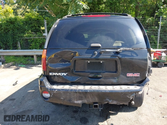 2005 GMC Envoy SLE with VIN 1GKDS13S452208252, listed as a IAAI auction lot 42357457 with 197,419 mi miles and . Bid and sale history available at DreamBid. Image 16.