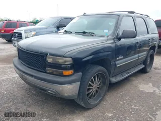 2003 Chevrolet Tahoe LT with VIN 1GNEC13Z13J297511, listed as a IAAI auction lot 41902595 with 293,195 mi miles. Bid and sale history available at carsss.com. Image 2.