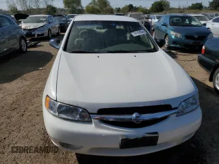 2001 Nissan Altima GXE with VIN 1N4DL01D61C157418, listed as a Copart auction lot 74142864 with 138,369 mi miles and Salvage Title. Bid and sale history available at carsss.com. Image 5.