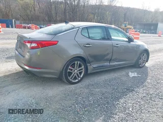 2013 Kia Optima SX with VIN 5XXGR4A68DG172070, listed as a IAAI auction lot 40820289 with 147,124 mi miles and . Bid and sale history available at DreamBid. Image 4.