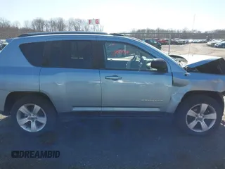 2013 Jeep Compass Latitude with VIN 1C4NJDEB2DD263920, listed as a IAAI auction lot 41832542 with 128,018 mi miles. Bid and sale history available at carsss.com. Image 13.