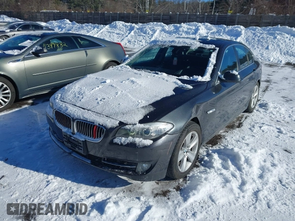 2013 BMW 5 Series 528i xDrive with VIN WBAXH5C55DDW12945, listed as a IAAI auction lot 41343124 with 137,672 mi miles and . Bid and sale history available at carsss.com. Image 2.