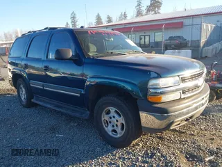 2005 Chevrolet Tahoe LT z VIN 1GNEK13T15J196213, wystawiony jako IAAI lot #41421135 z przebiegiem 187 619 mil mil oraz . Historia ofert i sprzedaży dostępna na DreamBid. Obrazek 1.