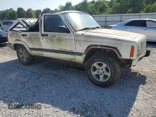 1999 Jeep Cherokee Sport z VIN 1J4FF68S3XL597049, wystawiony jako Copart lot #58736325 z przebiegiem 134 684 mil mil oraz Nie do naprawy • Non repairable. Historia ofert i sprzedaży dostępna na DreamBid. Obrazek 4.