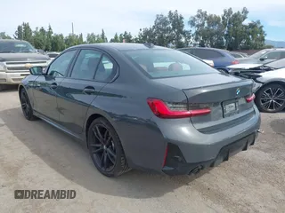 2024 BMW 3 Series 330i with VIN 3MW69FF04R8E27076, listed as a IAAI auction lot 41669381 with 12,057 mi miles. Bid and sale history available at carsss.com. Image 3.