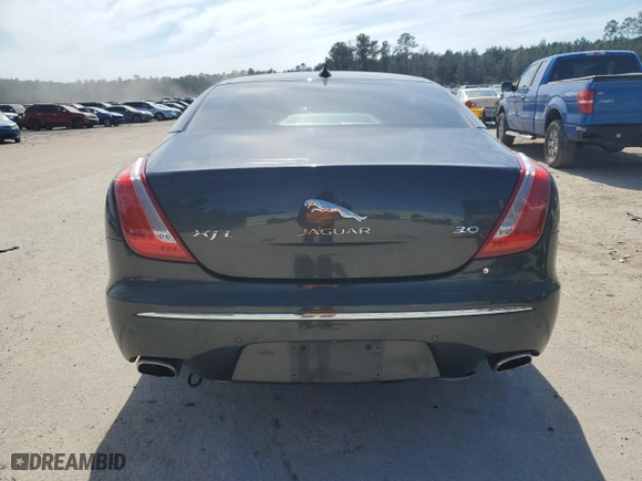 2015 Jaguar XJ with VIN SAJWA2GZ5F8V87671, listed as a Copart auction lot 46526865 with 44,382 mi miles and Salvage Title. Bid and sale history available at carsss.com. Image 6.