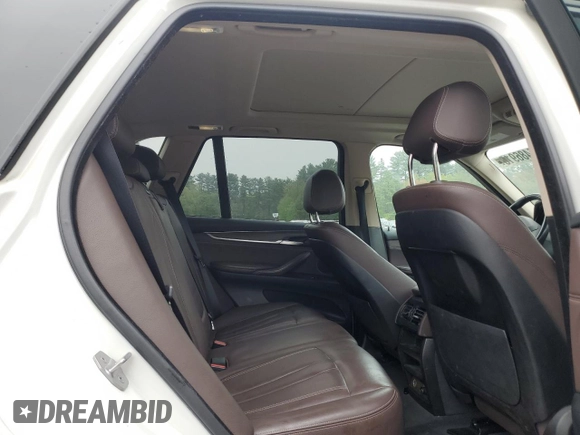 2016 BMW X5 xDrive35i z VIN 5UXKR0C51G0P31731, wystawiony jako Copart lot #55486915 z przebiegiem 93 906 mil mil oraz Szkoda całkowita • Salvage title. Historia ofert i sprzedaży dostępna na DreamBid. Obrazek 11.