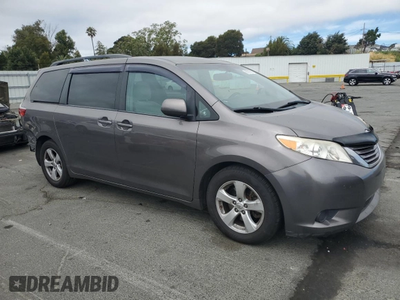 2015 Toyota Sienna LE AAS with VIN 5TDKK3DC1FS577795, listed as a Copart auction lot 66215355 with 197,902 mi miles and Salvage title. Bid and sale history available at DreamBid. Image 4.