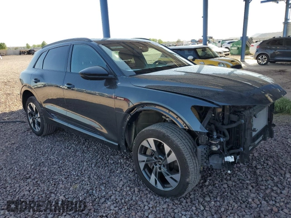 2023 Audi e-tron Premium with VIN WA1AAAGE3PB023323, listed as a Copart auction lot 69809524 with 31,564 mi miles and Salvage Title. Bid and sale history available at DreamBid. Image 4.