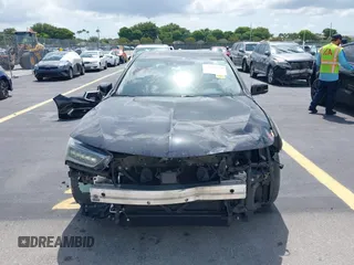 2019 Acura TLX Technology z VIN 19UUB2F43KA010490, wystawiony jako IAAI lot #42382271 z przebiegiem 40 892 mil mil oraz . Historia ofert i sprzedaży dostępna na DreamBid. Obrazek 13.