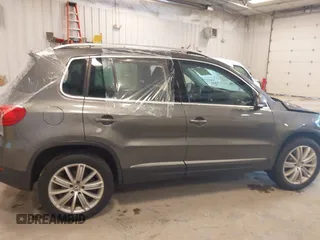 2012 Volkswagen Tiguan SE with VIN WVGBV7AX6CW093750, listed as a IAAI auction lot 42329775 with 117,509 mi miles and . Bid and sale history available at DreamBid. Image 13.