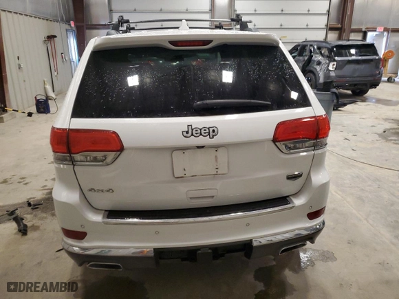 2014 Jeep Grand Cherokee Summit with VIN 1C4RJFJT7EC106290, listed as a Copart auction lot 52001295 with 137,266 mi miles and Non Repairable. Bid and sale history available at carsss.com. Image 6.