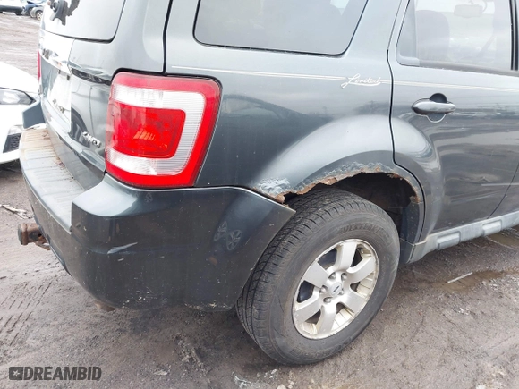 2009 Ford Escape Limited with VIN 1FMCU94G49KC50139, listed as a IAAI auction lot 41748414 with 176,919 mi miles. Bid and sale history available at carsss.com. Image 6.