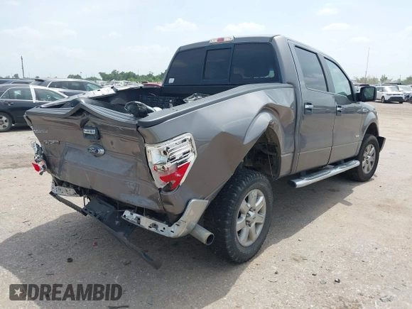 2014 Ford F-150 XL with VIN 1FTFW1CT6EKE47108, listed as a IAAI auction lot 42647142 with 73,827 mi miles and . Bid and sale history available at DreamBid. Image 4.