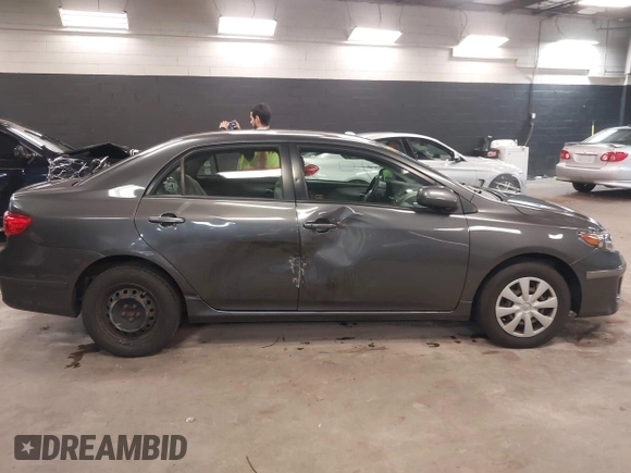 2011 Toyota Corolla L with VIN JTDBU4EE3BJ102060, listed as a IAAI auction lot 42140081 with 125,989 mi miles. Bid and sale history available at carsss.com. Image 13.