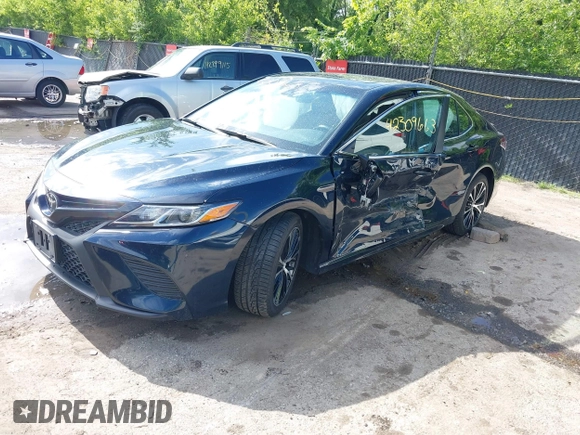 2018 Toyota Camry LE with VIN 4T1B11HK2JU579550, listed as a IAAI auction lot 42309663 with 40,868 mi miles and . Bid and sale history available at DreamBid. Image 2.