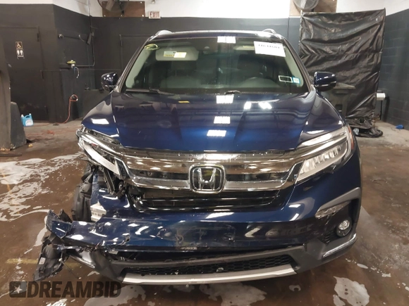 2022 Honda Pilot Touring 7-Passenger with VIN 5FNYF6H65NB052164, listed as a IAAI auction lot 41641601 with 51,700 mi miles. Bid and sale history available at carsss.com. Image 12.