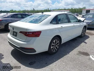 2023 Volkswagen Jetta S with VIN 3VW5M7BU5PM024589, listed as a IAAI auction lot 39713026 with 8,447 mi miles. Bid and sale history available at carsss.com. Image 4.